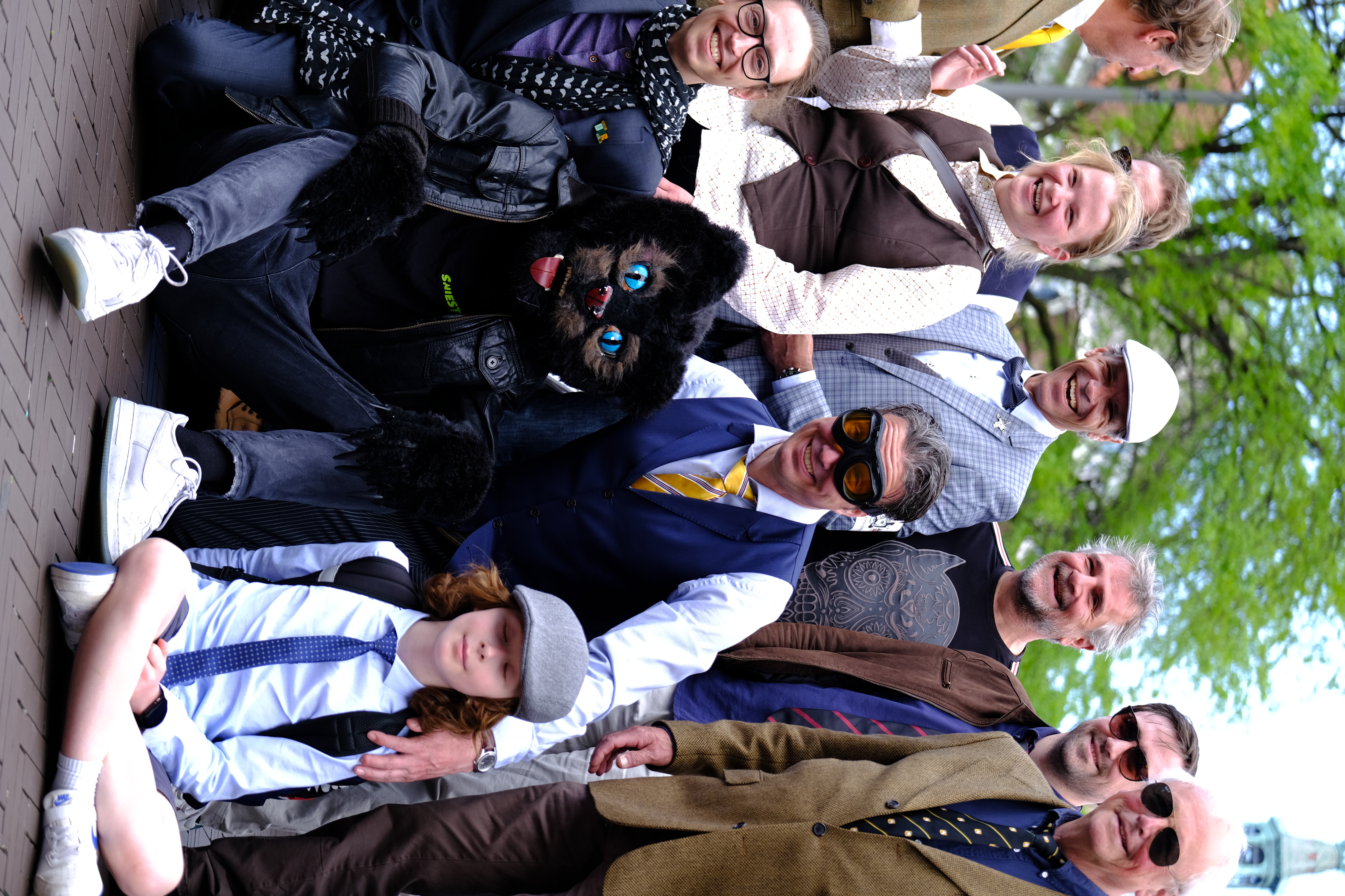 Gentleman’s Ride group of smiling riders in classic attire (B&W), The Hague 2024